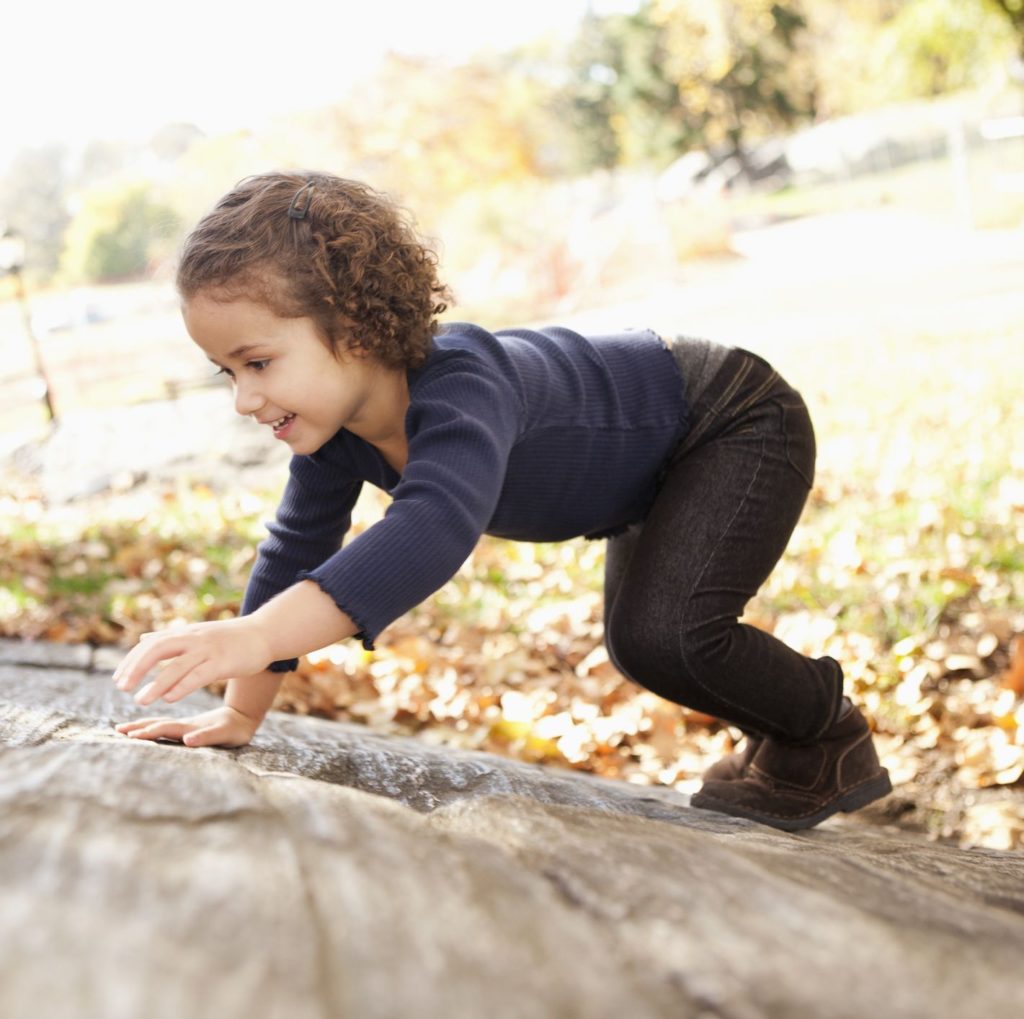 Child bear walking up incline